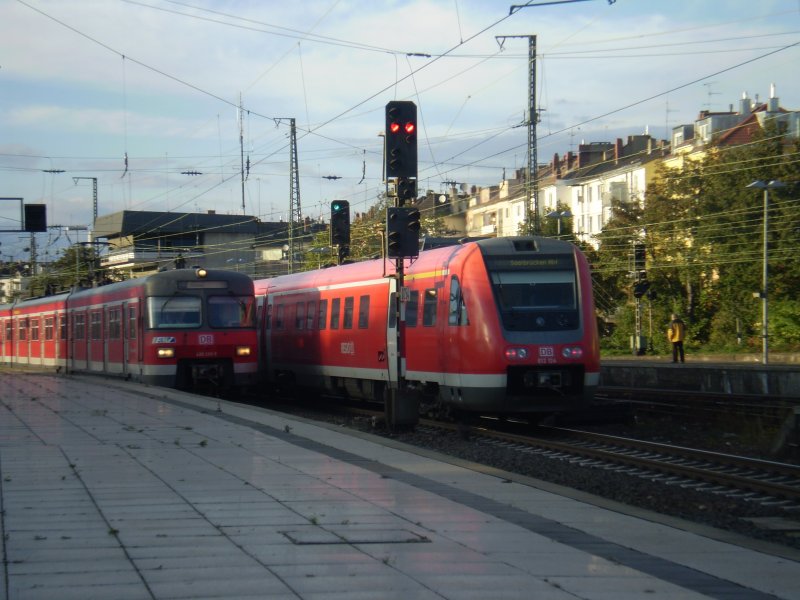Ein 420er nach Hanau  und ein 612 nach Saarbrcken bei der Ein- bzw. Ausfahrt des Mainzer Hbfs.  18.10.09 