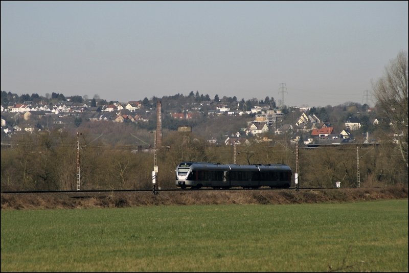 Ein ET23 ist zwischen Witten und Wetter(Ruhr) als ABR33809 (RB40  Ruhr-LENNE-Bahn ) nach Hagen Hbf unterwegs. (20.03.2009)
