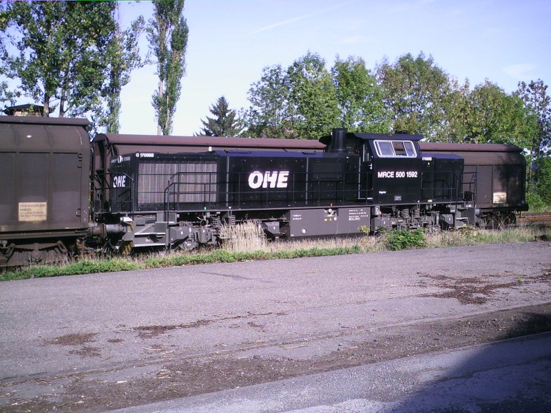 Eine MaK G 1700 angemietet bei der OHE mit einem Gipsplattenzug in Stadtoldendorf.