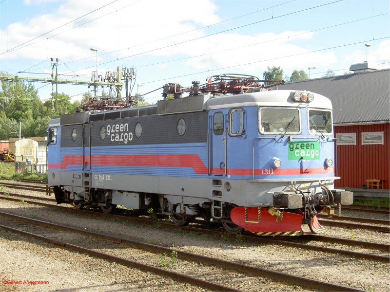Eine Scchwedische GC Rc4 1311 der Firma GREEN CARGO am 18.07.2006 in Sundsvall.
