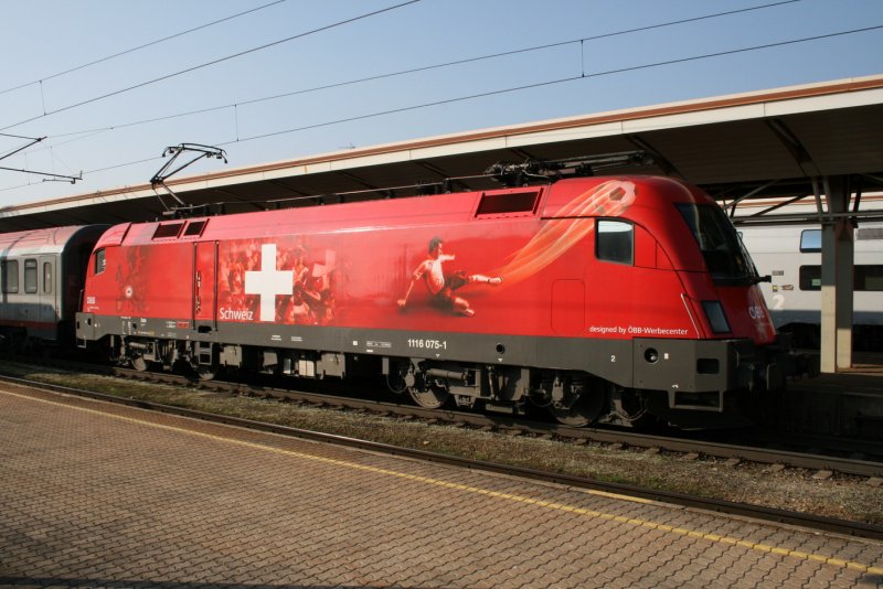 EM-Lok Schweiz (Taurus 1116) am 09.03.2008 beim Halt im Bahnhof Amstetten.