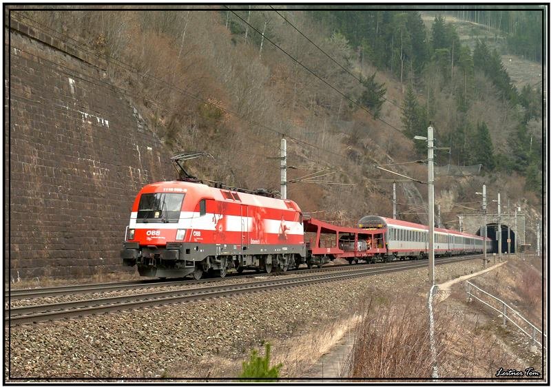 EM-Taurus 1116 005 sterreich fhrt mit EC 668  Caritas Kinderpatenschaften  von Graz nach Bregenz.Fotografiert beim Westportal Galgenbergtunnel St.Michael i.d.Steiermark.
9.3.2008