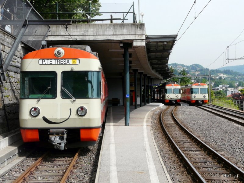 FLP - Im FLP Bahnhof von Lugano sind die Triebwagen Be 4/8 41 und der Be 4/8 42 (Regio nach Ponte Tresa) und der Be 4/12 21 .. Bild vom 13.05.2009