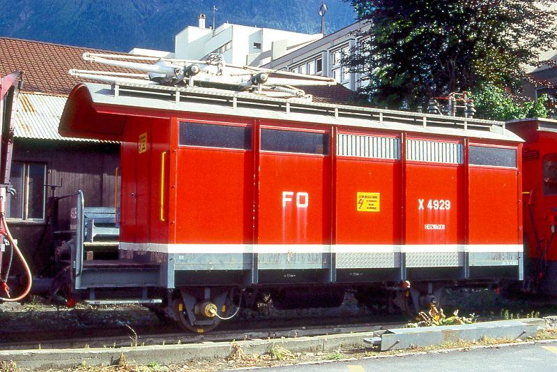 FO - X 4929II am 20.05.1996 in BRIG - HEIZWAGEN - 1 offene Plattform - Baujahr 1914 - Lyon - Gewicht 11,00t - LP 7,47m - zulssige Geschwindigkeit km/h 45 - =15.04.1986 - Lebenslauf: BFD K 410 - 1925 FO K 410 - 1959 Gkv 4420 - 1969 Gkv 4420 - 15.04.1986 X 4929II - Hinweis: Die ursprngliche Fahrzeugserie bestand aus 10 Wagen mit den Betriebsnummern K 401 - 410.

