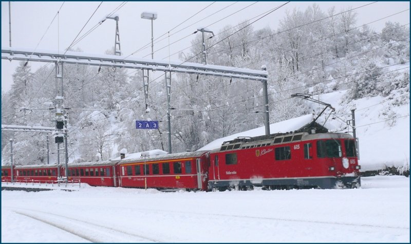 Ge 4/4 II 615  Klosters  schiebt den R1832 Richtung Davos Platz aus dem Bahnhof Filisur. (20.01.2009)