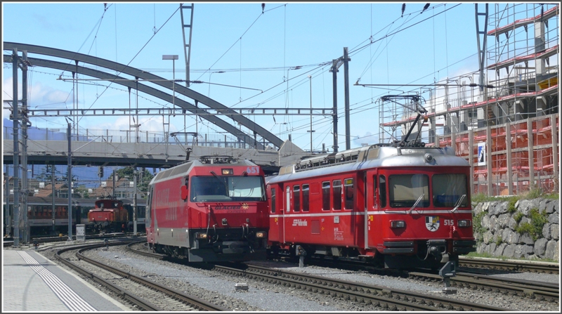 Ge 4/4 III 651  Fideris  und Be 4/4 515 in Chur. (19.07.2009)