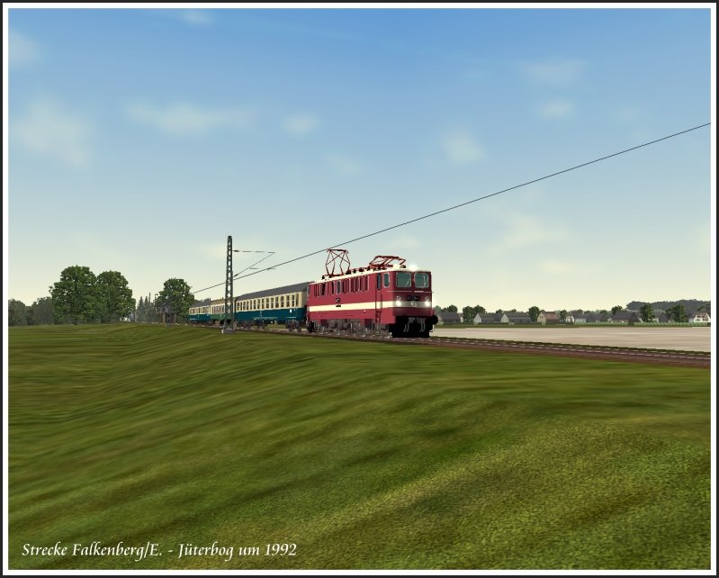 Hier nochmal 242 200 mit ihrem Zug bei Holzdorf/Elster.