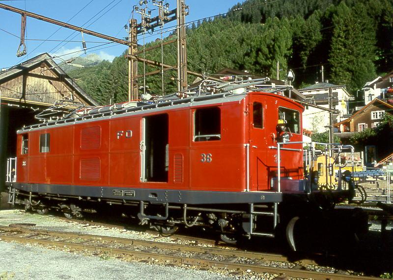 MGB exFO - HGe 4/4I 36 am 31.08.1997 in DISENTIS - Zahnrad-LOKOMOTIVE - Baujahr 1948 - SLM3975 - 911 KW - Gewicht 48,60t - LP 14,20m - zulssige Geschwindigkeit 55/30Z km/h
