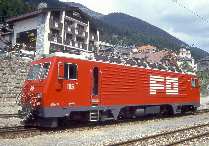 MGB exFO - HGe 4/4II 105 Name: ALPSU am 06.06.1993 in DISENTIS - Zahnrad-LOKOMOTIVE - bernahme 19.12.1986 - SLM5283/BBC - 1836 KW - Gewicht 64,00t - LP 14,78m - zulssige Geschwindigkeit 90/Z30 km/h -  Mutation: ex SBB/Brnig HGe 4/4II 1952 - 10/1990 an FO - Hinweis: noch alte Lackierung
