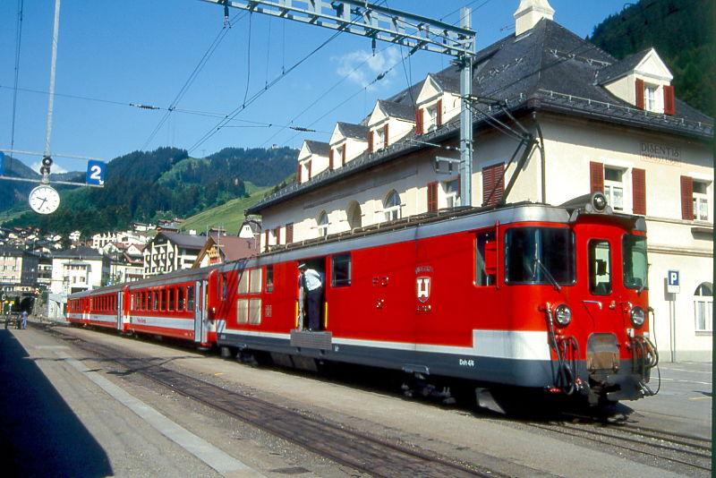 MGB FO-REGIONALZUG 120 von Dieni nach Disentis am 06.06.1993 in Disentis mit Zahnradtriebwagen Deh 4/4I 52 - B 4273 - B 4274 - ABt 4152. Hinweis: FO-Fahrzeuge in alter Lackierung. Bahnhofsanlagen vor Umbau.
