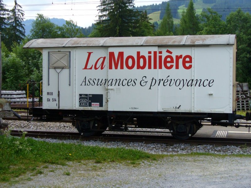 MOB - Abgestellter Werbe Gterwagen Gk 514  im Bahnhofsareal von Saanen am 29.07.2007