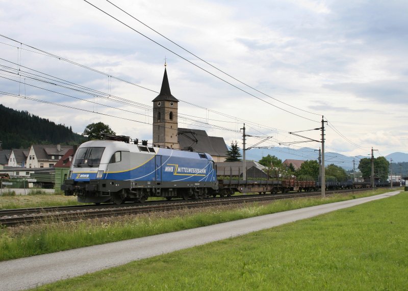 Nach dem Strzen gehts fr 1116.911 mit dem SGAG 95015, der mit Stahlbrammen beladen ist, weiter nach Deutschland. Hier durchfhrt der Zug gerade Kammern (16.06.2008)