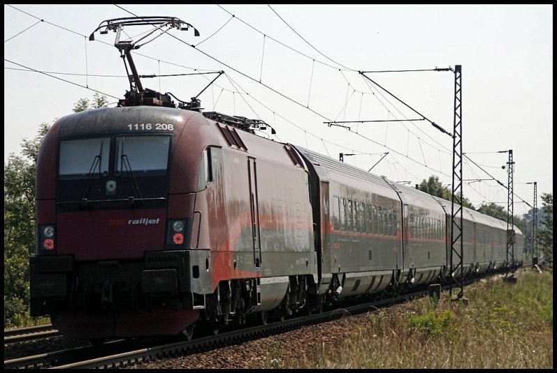 Nachschuss auf die 1116 208  Spirit of Eisenstadt  die hier den RJ 65 nach Wien West schiebt. (01.08.2009)