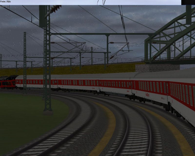 Nachtzug auf dem Weg in die Einfahrt meines Bahnhofs bei Nacht