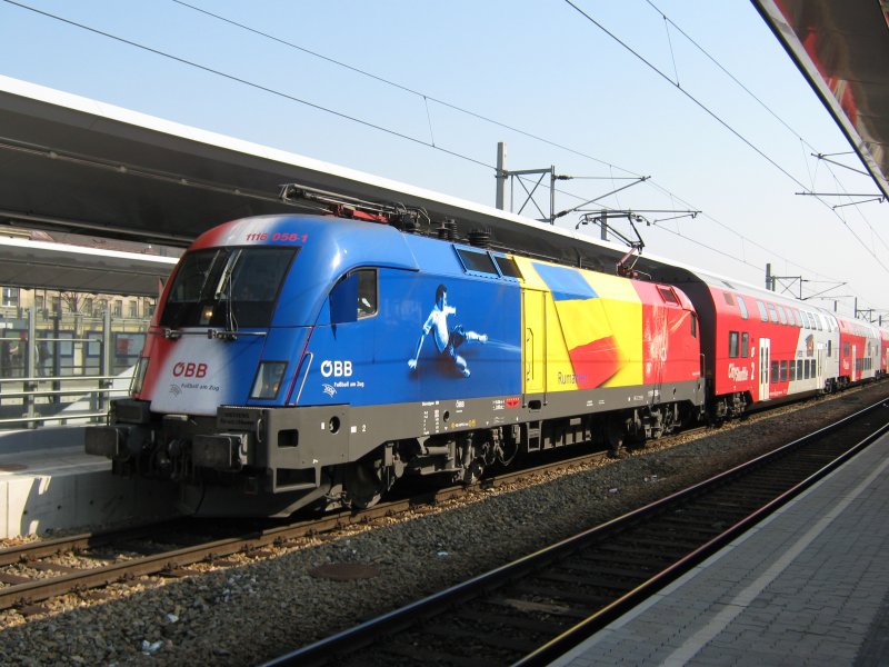 BB 1116 056-1  Rumnien  mit einem REX beim Halt in Wien Meidling. 07.04.2009.