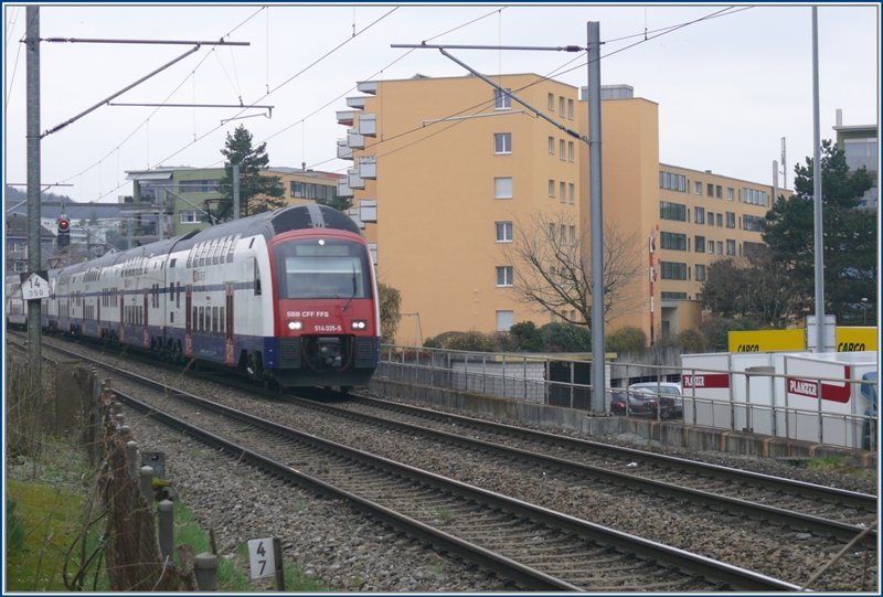 RABe 514 035-5 kommt von Urdorf her in Zrich Altstetten an. (31.03.2009)