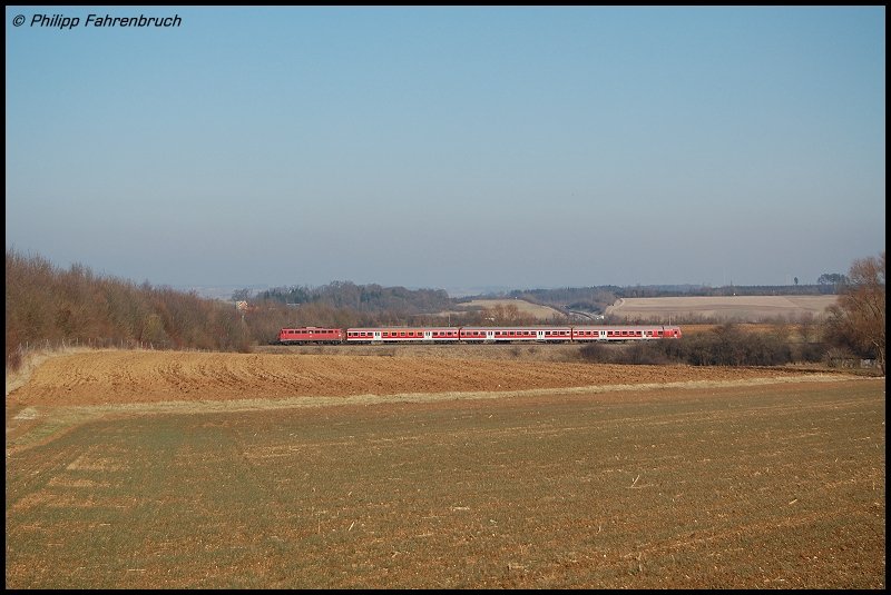 RB 37153 Aalen - Donauwrth, geschoben von 110 418-1, erreicht in Krze Westhausen, aufgenommen am Km 82 der Riesbahn (KBS 995).