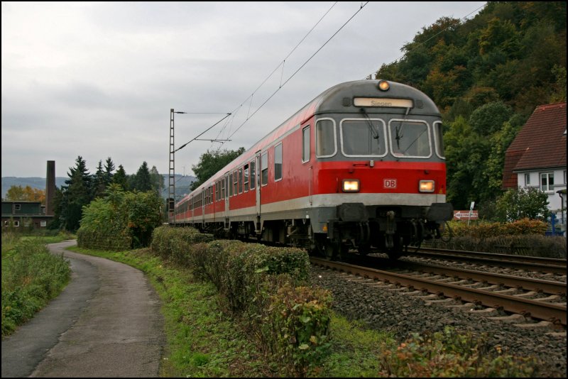 RB91 (RB 39172)  RUHR-SIEG-BAHN  von Siegen nach Hagen wird bei Hohenlimburg auf den Chip gebannt. Schiebelok ist die 143 202.