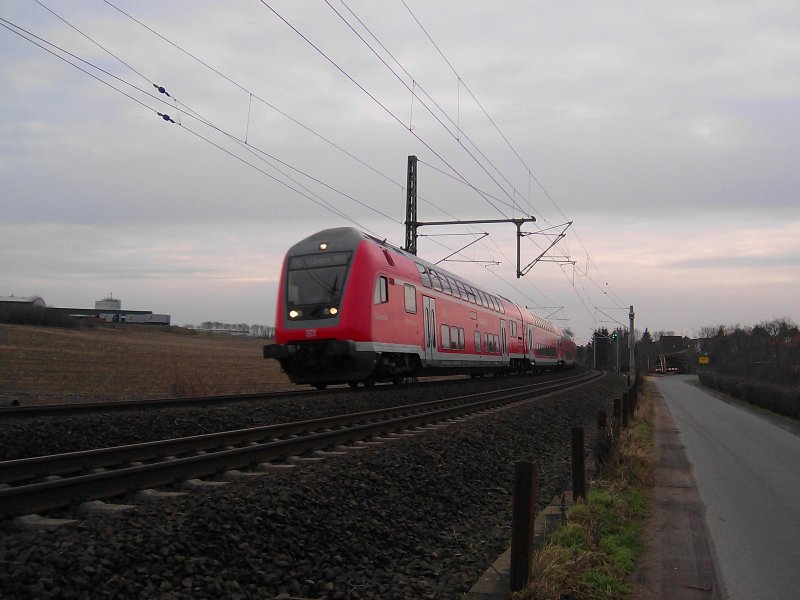 RE 21422 Hamburg Hbf - Lbeck Hbf kurz nach der Ausfahrt aus Reinfeld (Holst.) am 22.01.09.