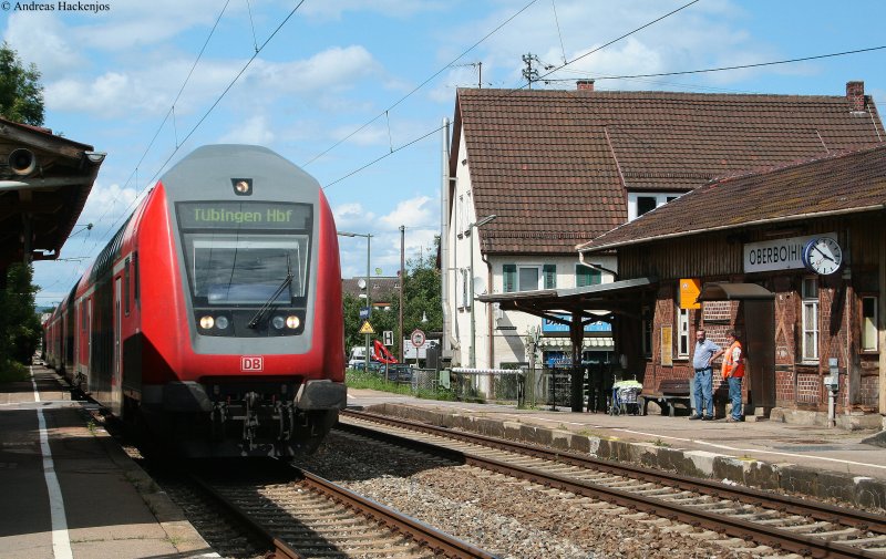 RE 22035 (Stuttgart Hbf-Tbingen Hbf) mit schublok 143 315-0 bei der Durchfahrt Oberboihingen 25.7.09