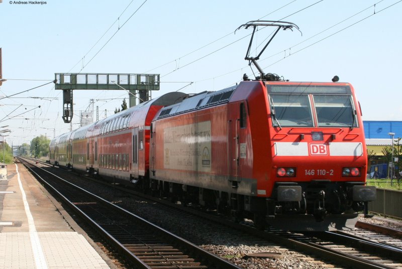 RE 31002 mit Schublok 146 110-2 bei der Einfahrt Friesenheim am 2.5.08