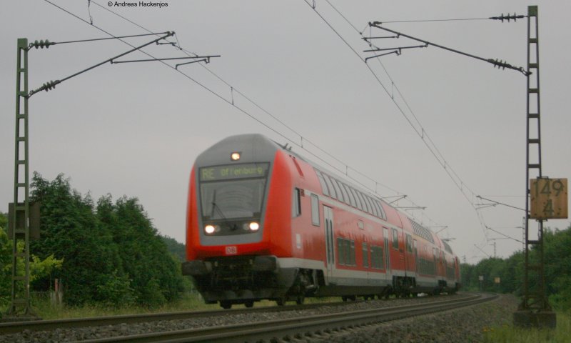 RE 31118 mit Schublok 146 110-2 am km 149,4 kurz vor Offenburg am 7.6.08