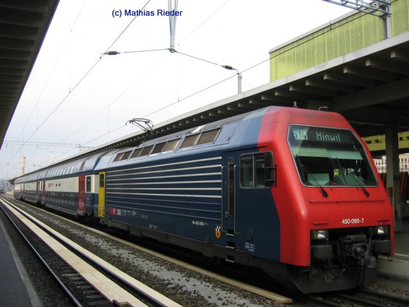 Re 450 099-7 *Volketswil* auf der S 14 Einfahrt in Zrich HB am 26.10.07
