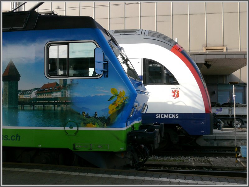 Re 456 096-7 SOB und S-Bahn 514 022-3 treffen sich in Rapperswil. (18.03.2008)