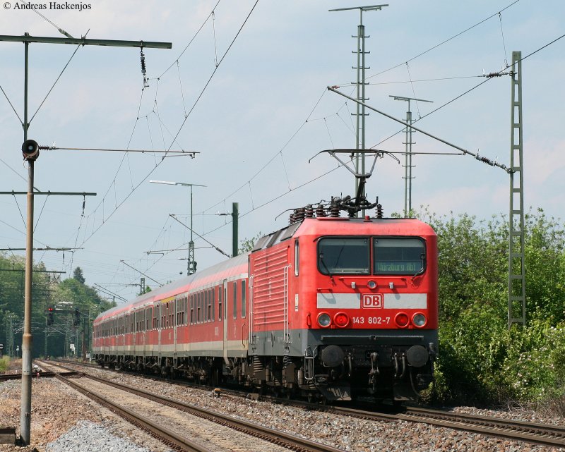 RE 4944 (Stuttgart Hbf-Wrzburg Hbf) mit Schublok 143 802-7 bei der Durchfahrt Knigshofen 22.5.09
