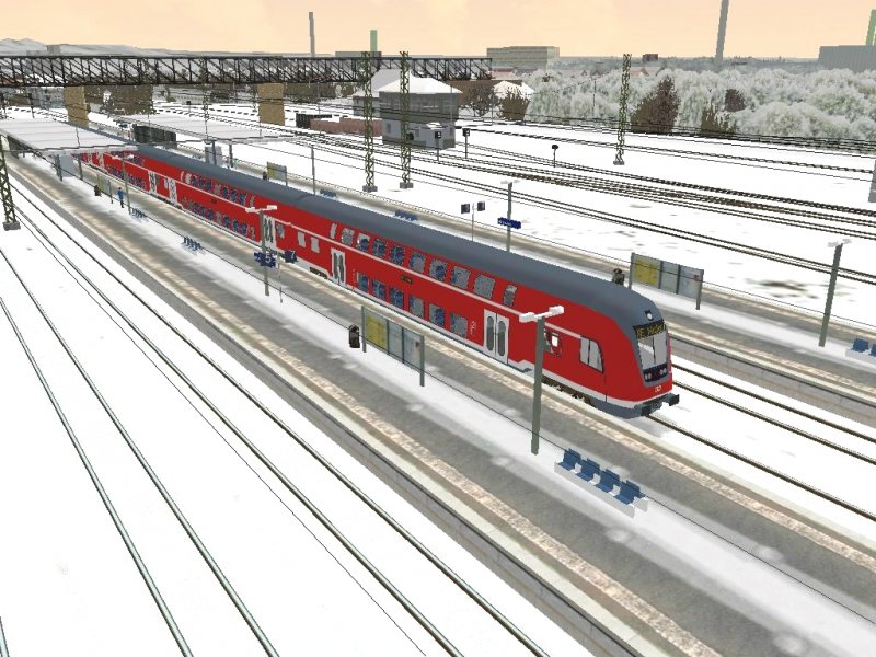 RE nach Offenbrurg in Weil am Rhein bei schlner Winterlandschaft.