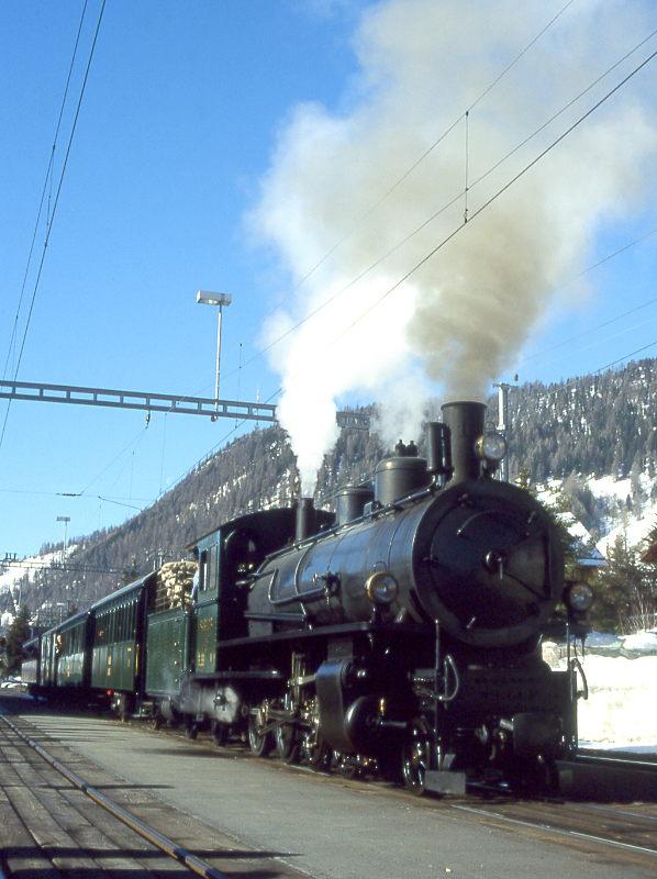 RhB Dampfextrazug 3723 von St.Moritz nach Scuol am 02.03.1997 in Celerina mit Dampflok G 4/5 108 - A 1102 - B 2060 - D 4052I - B 2245.  