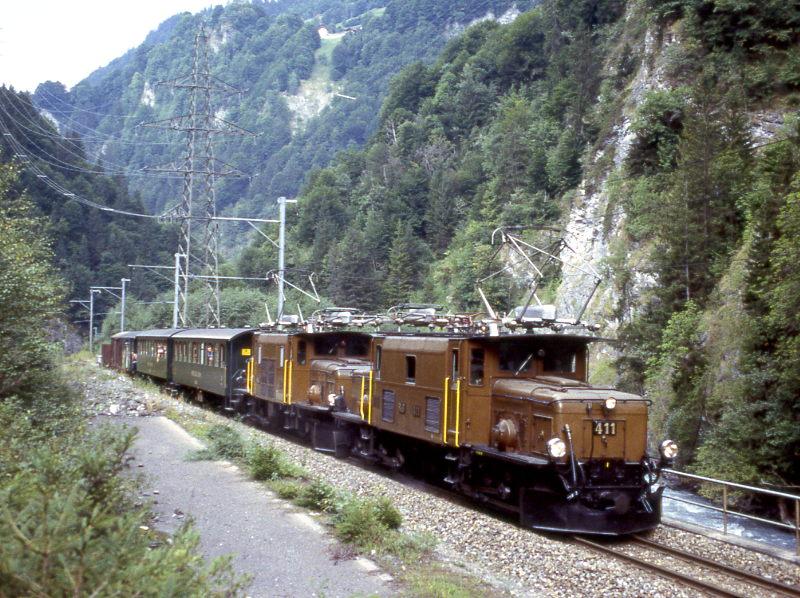 RhB Extra-GmP fr GRAUBNDEN TOURS von Landquart nach Davos-Platz vom 28.08.1997 zwischen Fideris und Kblis mit Ge 6/6 411 - Ge 6/6I 414 - B 2246 - B 2246 - D 4052I - Gb 5032 - E 6623 - Kk 7052