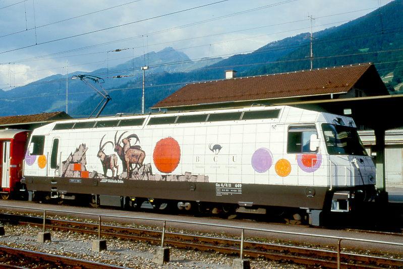 RhB - Ge 4/4 III 649  LAVIN  am 28.08.1997 in Landquart - Drehstrom-Universallokomotive - bernahme 08.12.1994 - SLM5636/ABB - 3200 KW - Gewicht 62,00t - LP 16,00m - zulssige Geschwindigkeit 100 km/h - Logo RhB deutsch - Werbung: BCU - gescanntes Dia 
