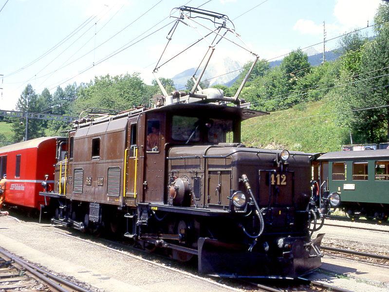 RhB - Ge 6/6I 412 am 04.07.1999 in FILISUR - STRECKEN-LOKOMOTIVE - bernahme 27.11.1925 - SLM3045/BBC2242/MFO - 940 KW - Gewicht 66,00t - LP 13,30m - zulssige Geschwindigkeit 55 km/h. 
