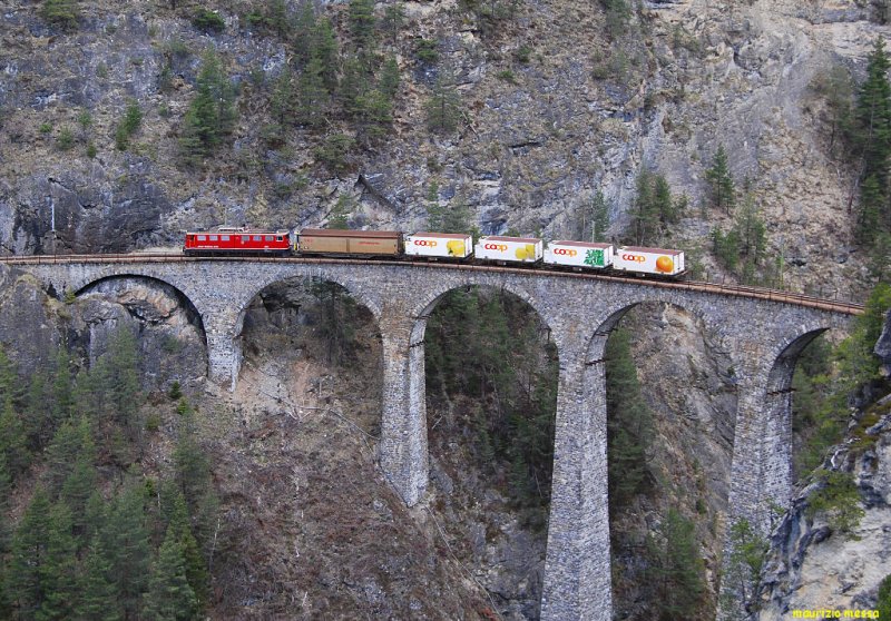 RhB Ge6/6  704 with a freight train crossing the Filisur viadukt on the 2nd of May in 2008