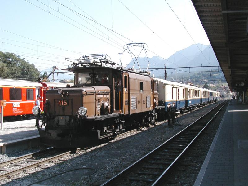 RhB Jubilum 100 Jahre Albulalinie,Der Alpine Classic Pullman Express mit RhB  Krokodil  Ge 6/6 I No.415 nach Samedan,am 29.06.03 in Chur