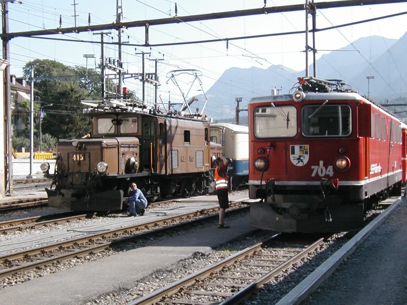RhB Jubilum 100 Jahre Albulalinie,Ge 6/6 I No.415 und Ge 6/6 II No.704 am 29.06.03 in Chur