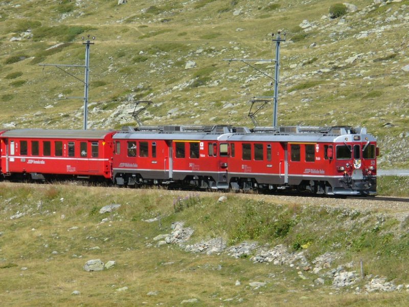 RhB -  Triebwagen ABe 4/4  52 + ABe 4/4  54 mit Personenzug unterwegs nach Tirano