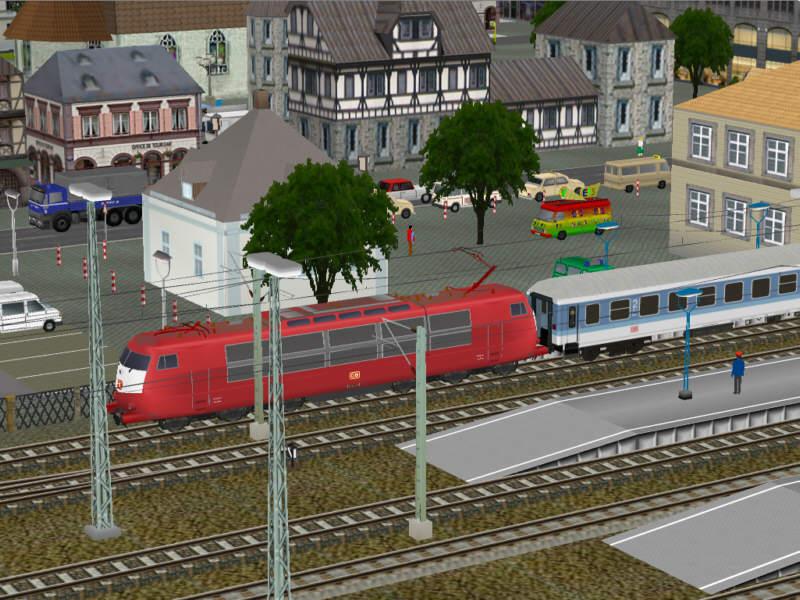 Screenshot aus der Modelleisenbahn-Simulation Eisenbahn.exe professionell (EEP): Eine BR 103 verlt mit einem Interregio einen Bahnhof. Screenshot aus einer selbst gestalteten Anlage ohne konkretes Vorbild.