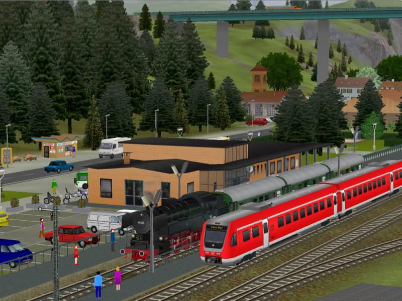 Screenshot aus der Modelleisenbahn-Simulation Eisenbahn.exe professionell (EEP): Ein moderner Triebzug (BR 612) und ein Nostalgiezug mit Dampflok BR 65 treffen sich an einem kleinen Bahnhof in den Bergen. Screenshot aus einer frei gestalteten Anlage ohne konkretes Vorbild.