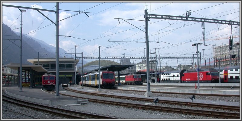 Stelldichein in Chur. Ge 4/4 I 605 Silvretta, NPZ, Re 4/4 II und Re 460. (15.09.2007)