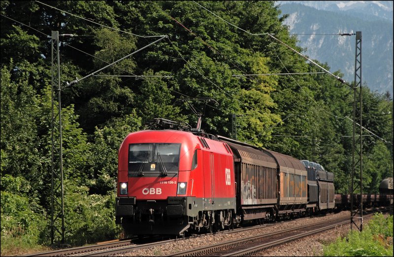 Teleaufnahme auf die 1116 126 die hier beim Kloster Raisach den 88834(?) von Hall in Tirol Richtung Norden bespannt.
