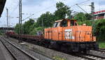BBL Logistik GmbH, Lüneburg mit ihrer Lok 'BBL 01' (NVR: '92 80 1214 002-8 D-BBL') und einem halb vollen Schotterzug am 27.05.24 Höhe Bahnhof Hamburg-Harburg.