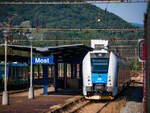 Ein ET mit der Nummer 640 107-9 wartet auf seine Abfahrtszeit im Bahnhof Most. Das Ziel des Zuges ist Decin hl.n. 
Aufgenommen aus einem Sonderzug nach Chomutov. 

16.09.2023