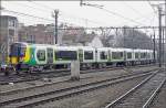 Ein britischer Triebzug auf belgischen Schienen? ;-) Fast am Ende des Gterzuges im Bahnhof Gent Sint Pieters befand sich die Class 350 245 der London Midland, eingereiht zwischen den Gterwagen.