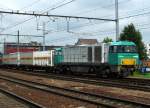 1106 durchfährt am 30.5.14 mit einem Containerzug Antwerpen-Berchem.