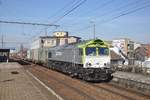 Class 66 266009-0 von Railtraxx mit Containerzug aufgenommen am 06.03.2021 in Bahnhof Mechelen Nekkerspoel 