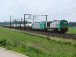 Zwei relativ neue SNCB-Anschaffungen fuhren am 12/06/2010 durch Ekeren nach Antwerpen-Noord : die Vossloh G2000BB, eingereiht unter Nummer 5702 mit der 2901 (Baureihe 186)und einem Containerzug am Haken.