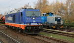 Raildox 76 110-0 und 650 077-7 am 19.11.2021 in Rostock-Bramow