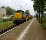 7778,7782 beide von Lineas kommen mit einem langen Kalkzug aus Hermalle-Huy(B) nach Veendam(NL) und fuhren durch Geleen-Lutterade und fuhren in Richtung Sittard(NL). Aufgenommen in Geleen-Lutterade(NL). 
Bei Regenwolken am Mittag vom 20.6.2019.